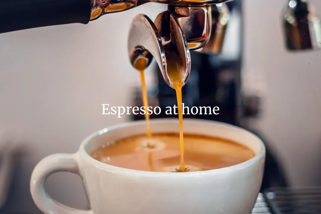 Espresso pouring into a white cup from a Breville home espresso machine — creamy, rich shot for café-style coffee at home.