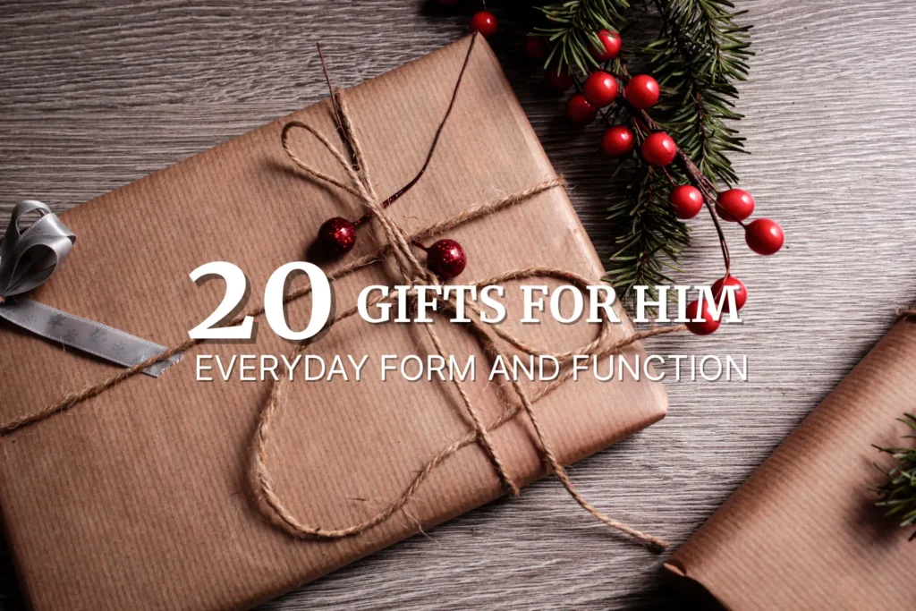 Brown paper gift boxes with twine and red berries, styled holiday image for 20 Gifts for Him Everyday Form and Function.