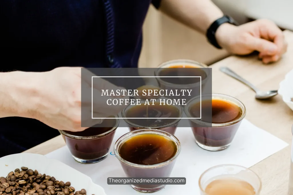 Cup of brewed coffee beside tasting glasses on wooden table promoting the Breville Luxe Brewer from The Organized Media Studio, specialty coffee at home setup.