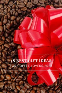 Red gift bow on a background of roasted coffee beans with text overlay that reads ‘18 Best Gift Ideas for Coffee Lovers 2025