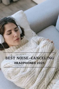 Woman in a cozy sweater reclining on a couch and wearing over-ear headphones, used in a roundup of the best noise cancelling headphones.