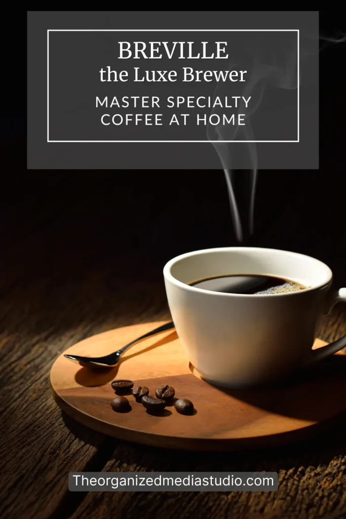 Steaming cup of black coffee on a wooden tray beside coffee beans, promoting Breville the Luxe Brewer and specialty coffee at home from The Organized Media Studio