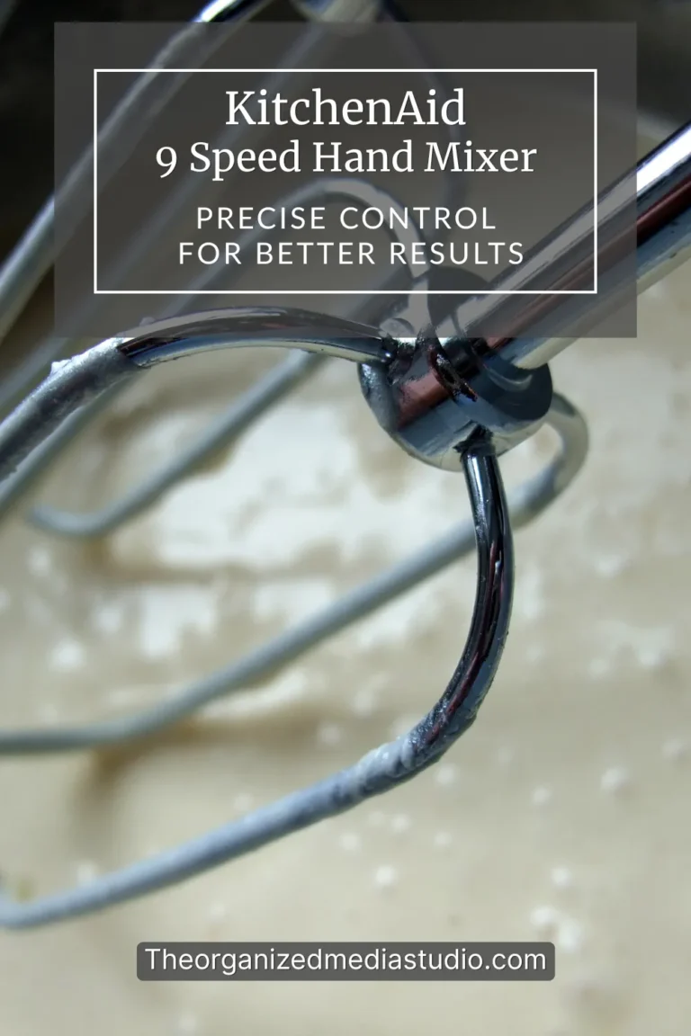 KitchenAid 9 Speed Hand Mixer hero image showing mixing beaters for precise control.