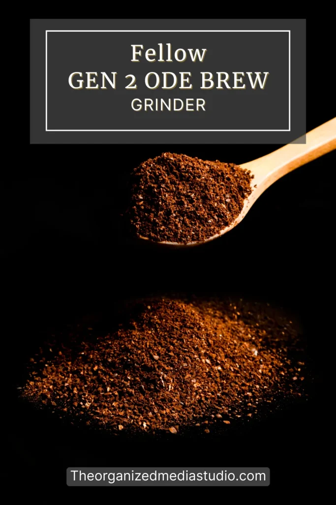 Wooden spoon filled with ground coffee above a pile of grounds on black background with overlay text