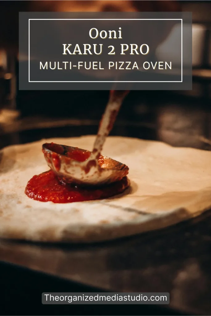 Tomato sauce being ladled onto pizza dough in an outdoor prep scene